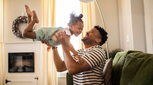 Dad plays with daughter